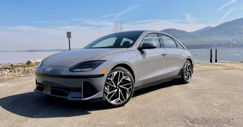 silver Hyundai Ioniq 6 sedan by the water