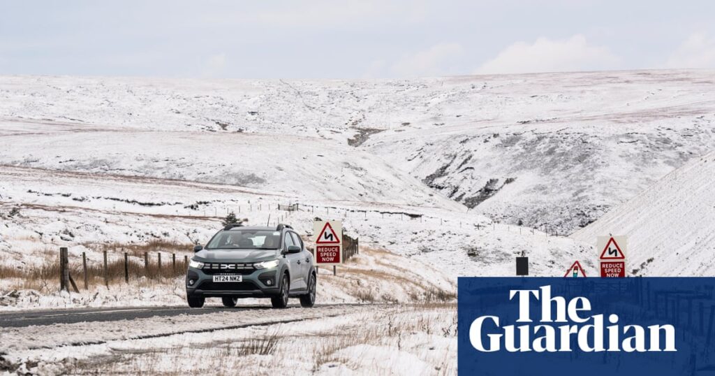 UK weather: snow and ice warning as commuters face widespread disruption | UK weather