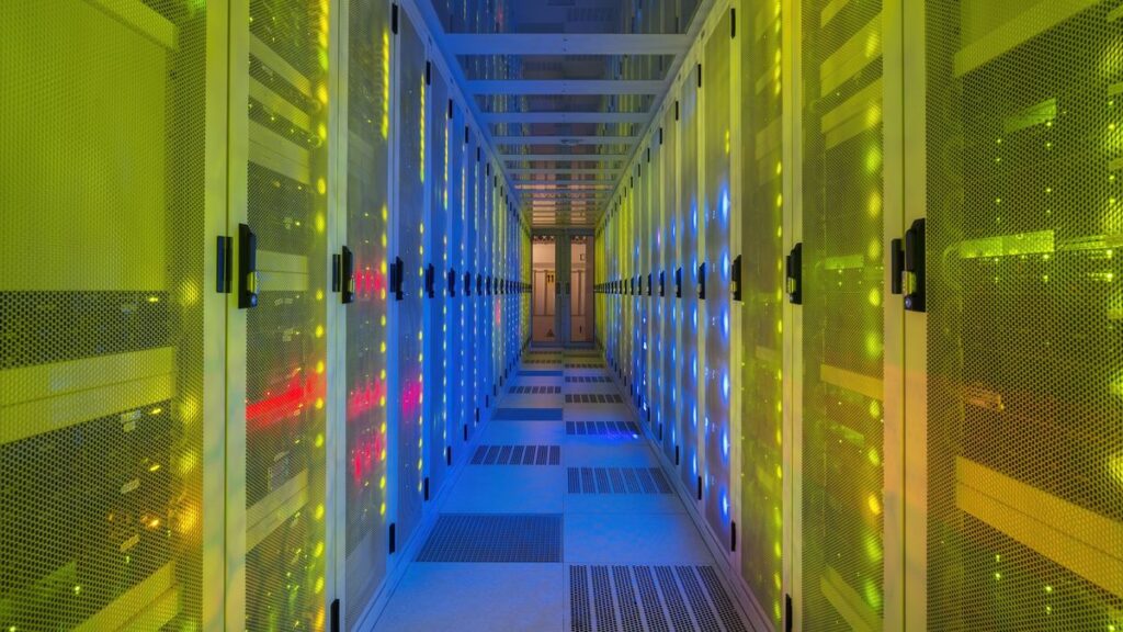 A room full of computer servers with multicolored lights