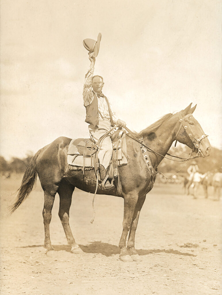 Booger Red Privett on horseback