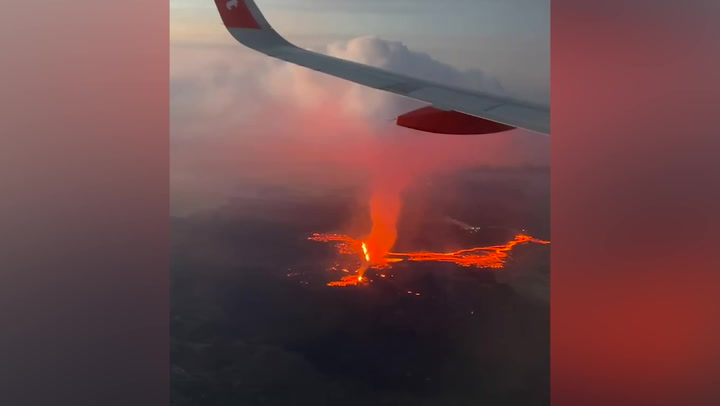 Moment easyJet plane flies over erupting Iceland volcano