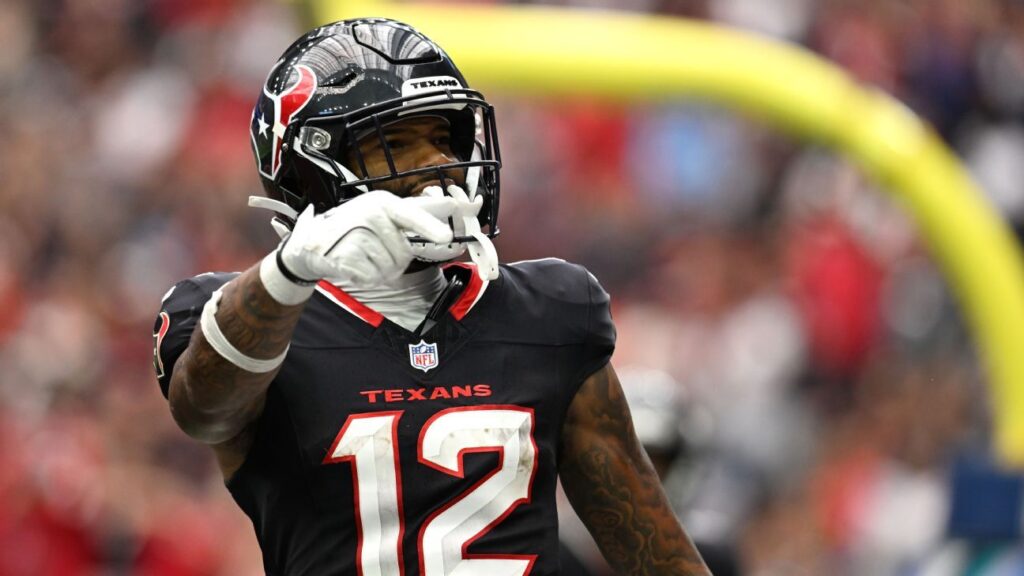 Texans' Collins: Fined for throwing TD ball to kid in stands