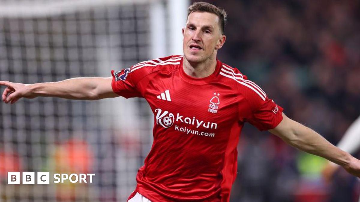 Chris Wood wheels away in celebration after putting Nottingham Forest ahead against Liverpool at The City Ground