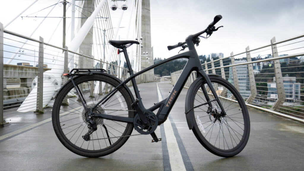 The Trek FX+ 7 on a bridge.