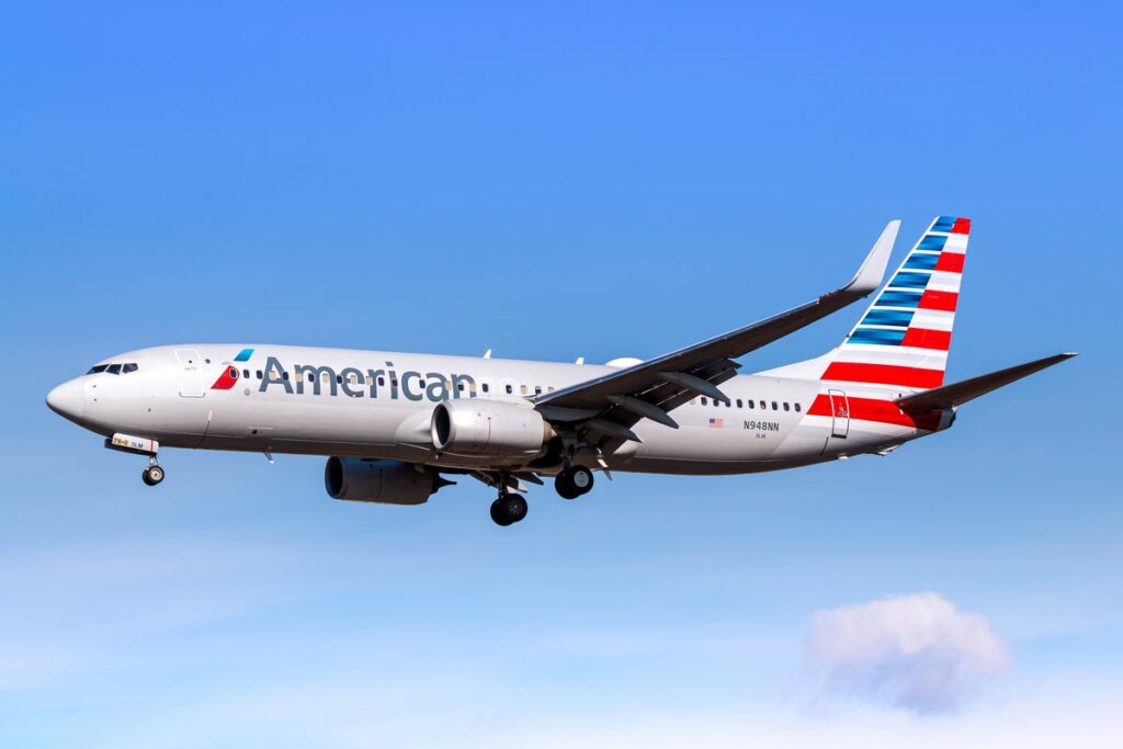 American Airlines passenger kicks crew member and swallows rosary beads in mid-air meltdown