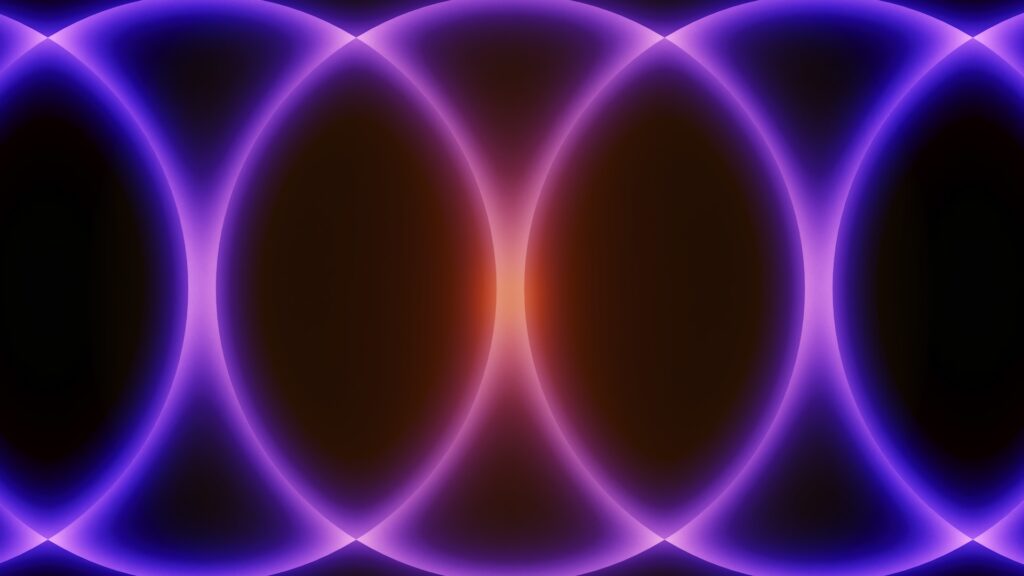 an abstract illustration of overlapping, glowing purple circles